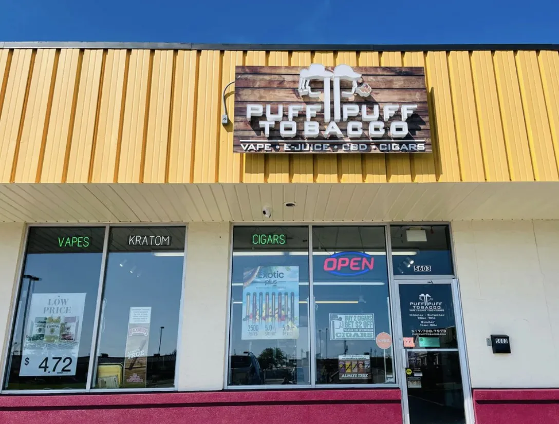 Puff Puff Tobacco storefront with Vape, E-Juice, CBD and Cigars sign